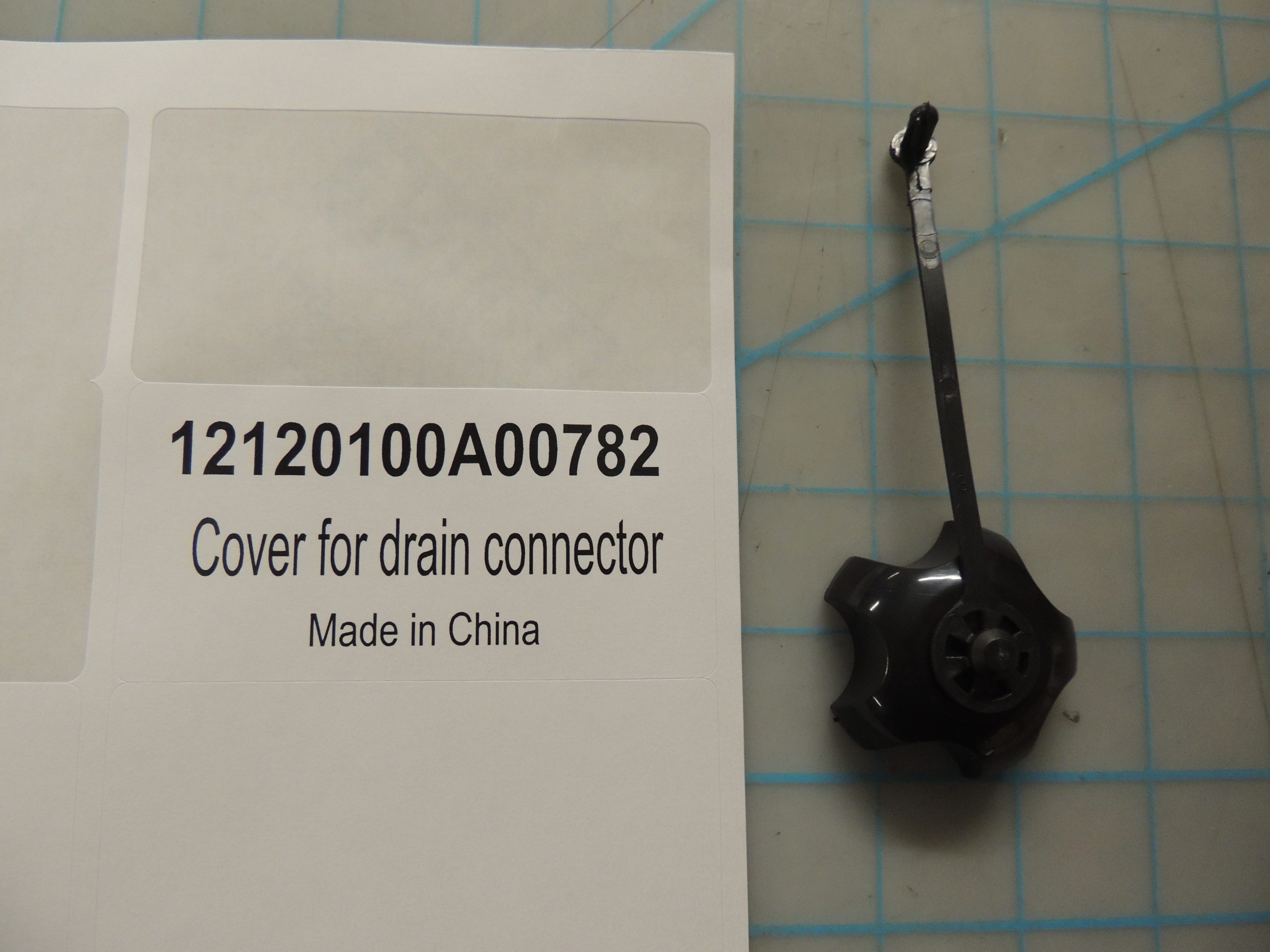 Cover for drain connector